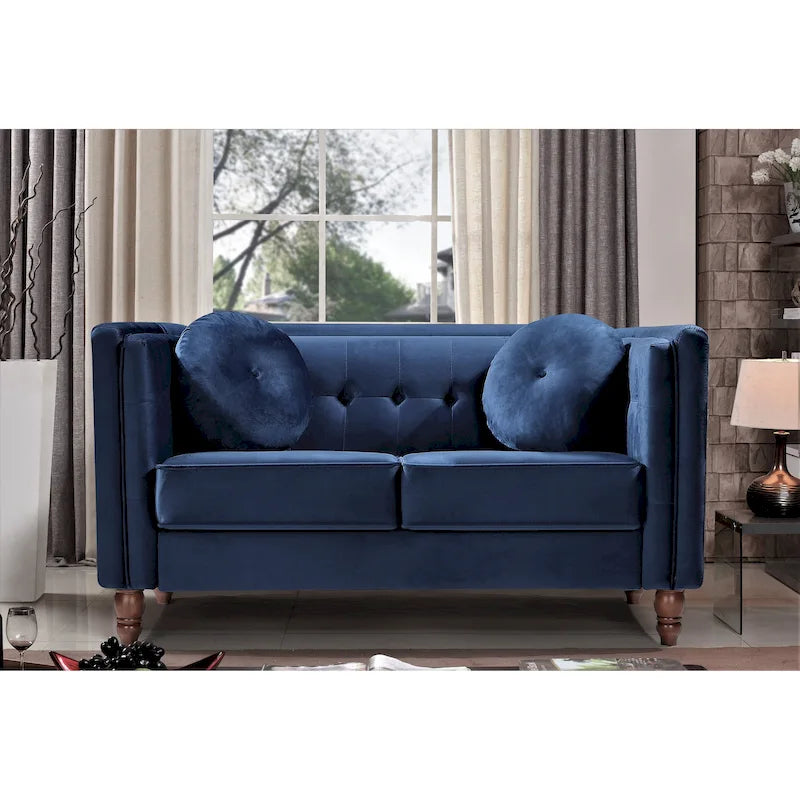 Polstersofa aus Samt mit Knopfheftung an Rückenlehne und Kissenrollen