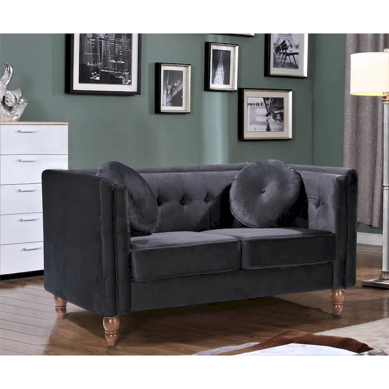 Polstersofa aus Samt mit Knopfheftung an Rückenlehne und Kissenrollen