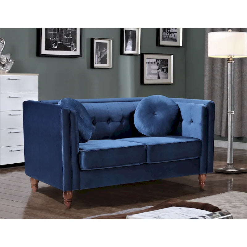 Polstersofa aus Samt mit Knopfheftung an Rückenlehne und Kissenrollen
