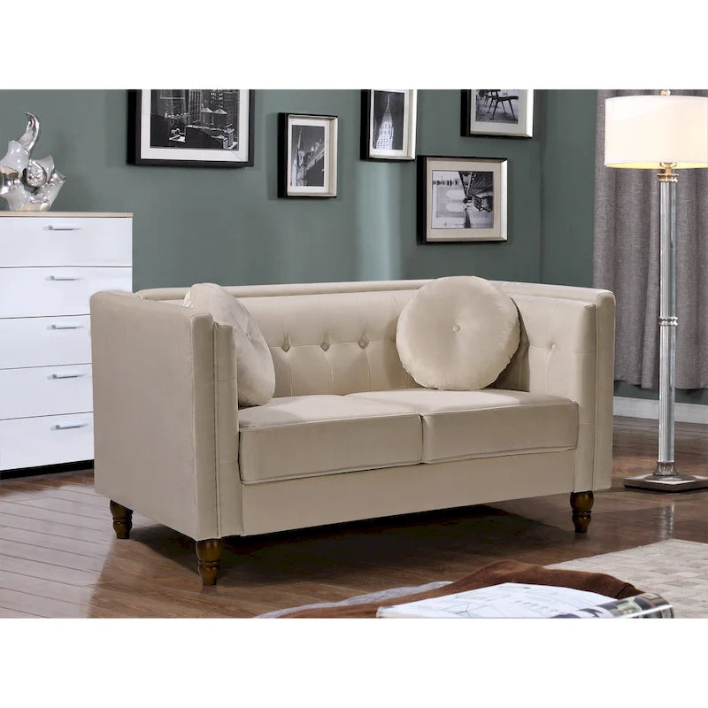 Polstersofa aus Samt mit Knopfheftung an Rückenlehne und Kissenrollen
