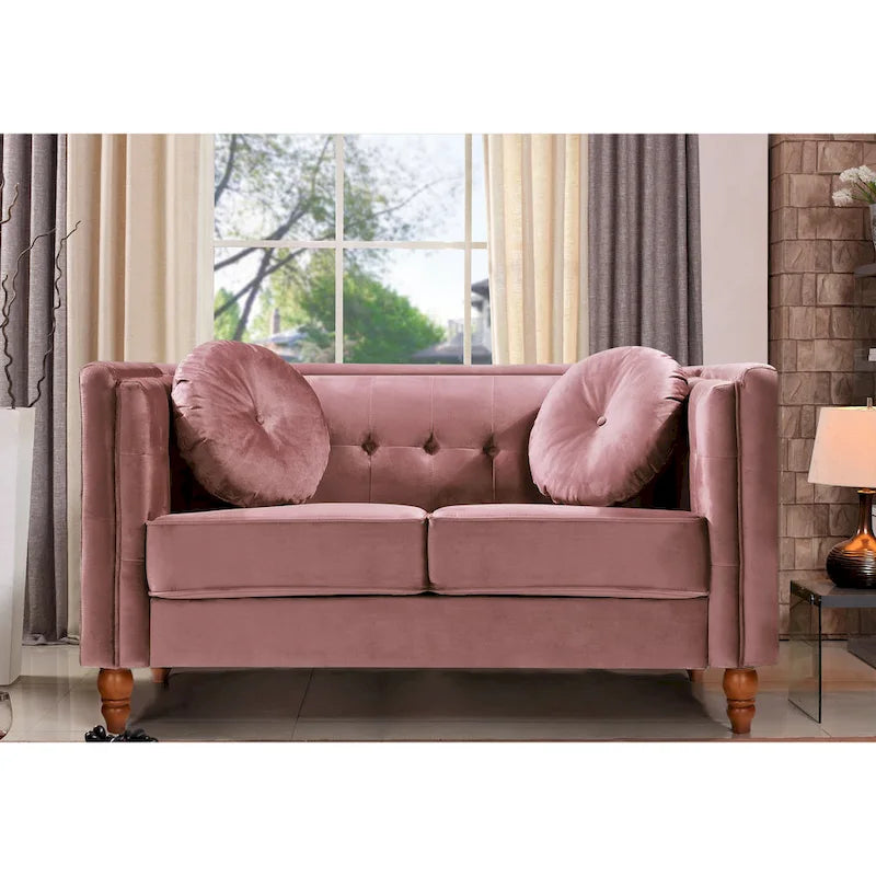 Polstersofa aus Samt mit Knopfheftung an Rückenlehne und Kissenrollen