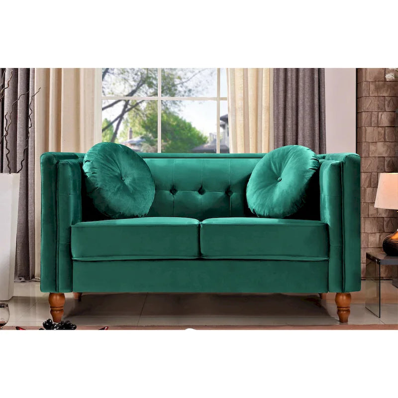 Polstersofa aus Samt mit Knopfheftung an Rückenlehne und Kissenrollen