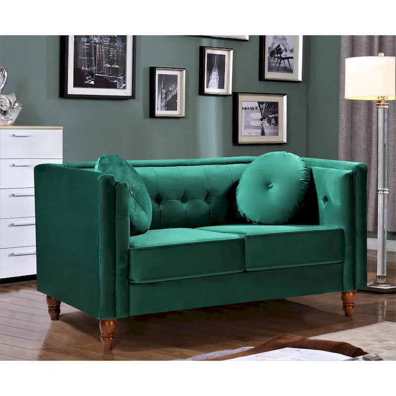 Polstersofa aus Samt mit Knopfheftung an Rückenlehne und Kissenrollen